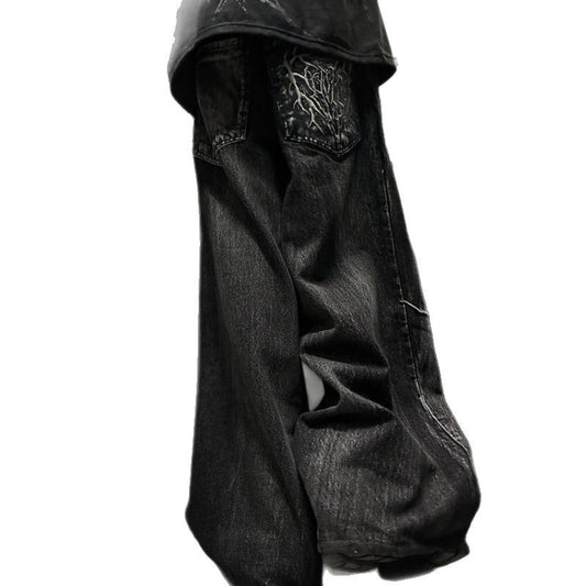 Jean style high street avec patch brodé motif araignée