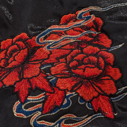 Veste casual avec broderie rose et corbeau bleu