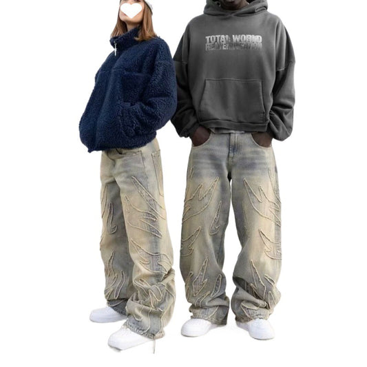 Jean ample, coupe droite et large, déchiré avec broderie