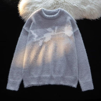 Pull avec motif fleurs rouges en velours floqué