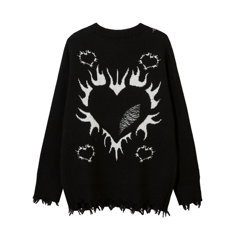 Pull déchiré avec motif cœur