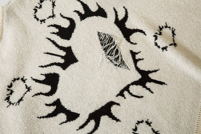 Pull déchiré avec motif cœur