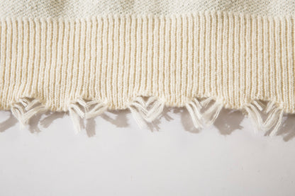 Pull déchiré avec motif cœur