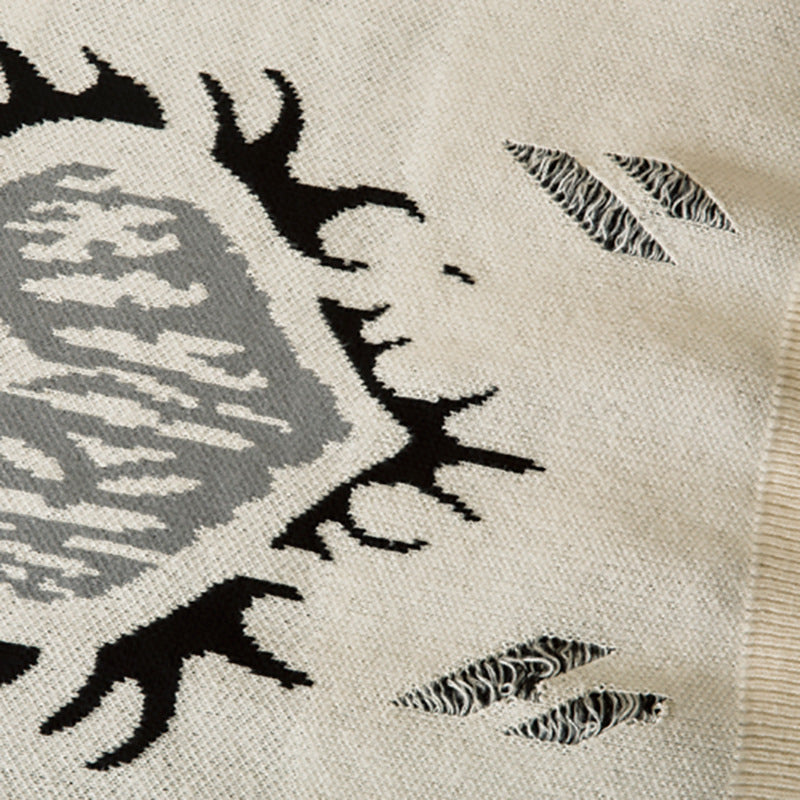 Pull déchiré avec motif cœur