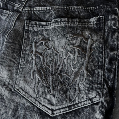 Jean style high street avec patch brodé motif araignée
