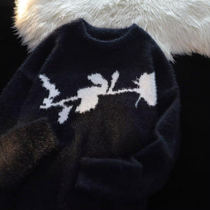 Pull avec motif fleurs rouges en velours floqué