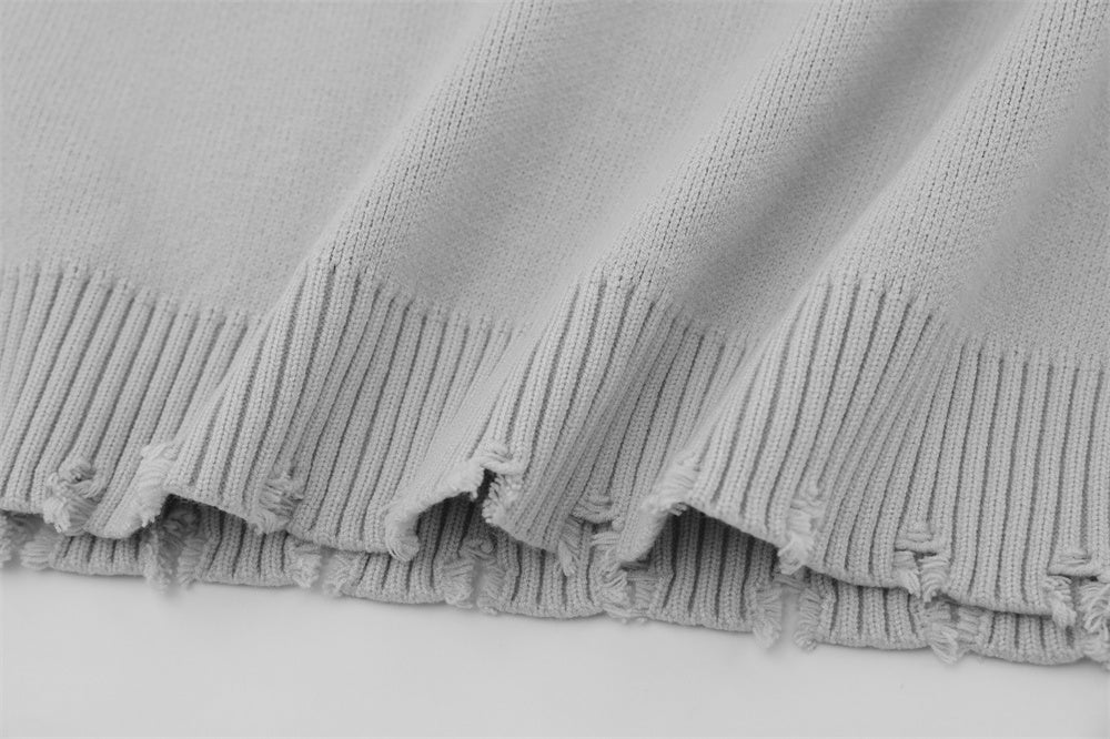 Pull déchiré avec motif squelette draconique