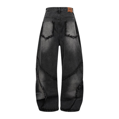 Pantalon style heavy industry, délavé et vieilli, coupe droite et large, avec ourlet effiloché