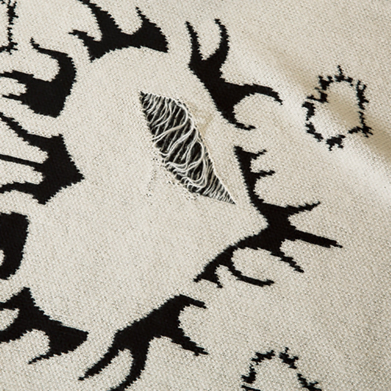 Pull déchiré avec motif cœur