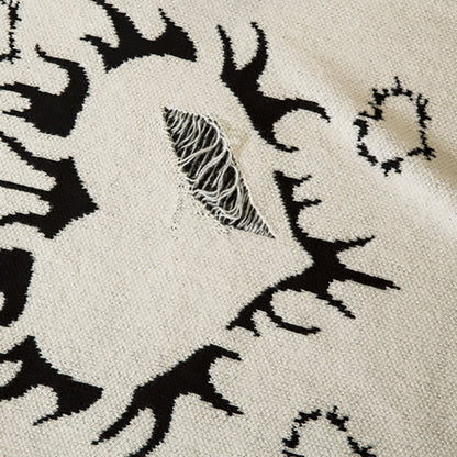 Pull déchiré avec motif cœur