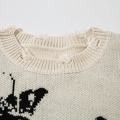 Pull avec motif papillon et effet éclaboussure d’encre