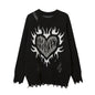 Pull déchiré avec motif cœur
