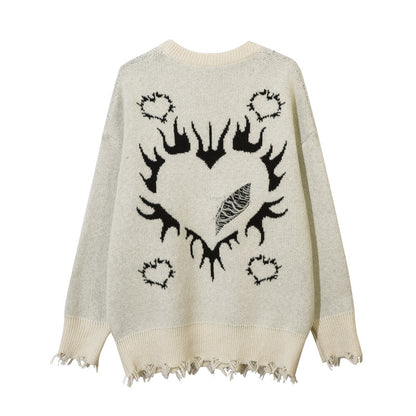 Pull déchiré avec motif cœur
