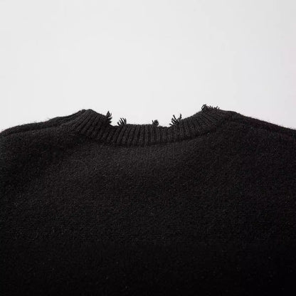 Pull déchiré tendance à motif tête de mort