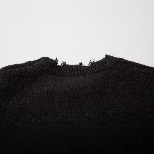 Pull déchiré tendance à motif tête de mort