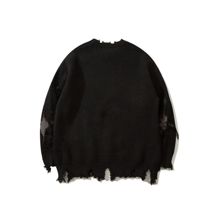 Pull déchiré tendance à motif tête de mort