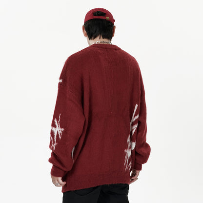 Pull à col rond avec broderie graffiti